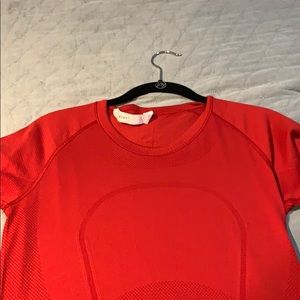 size 8 red swiftly tech workout top